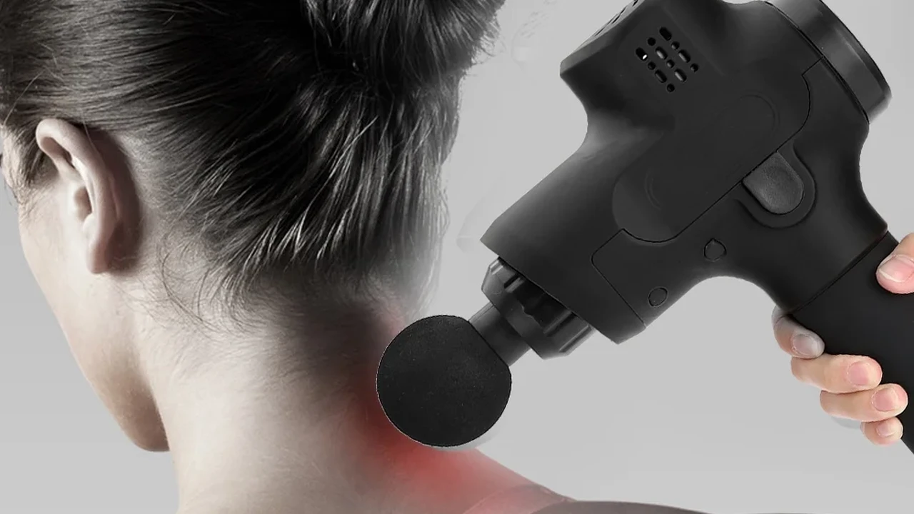 Close up on a plate of mashed potatoes, topped with baked pork chops with cream of mushroom soup, and a side of green beans.